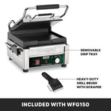 A stainless steel Waring Compact Toasting Grill with cast iron plates, an open grill top, removable drip tray, and control panel. Next to it is a heavy-duty grill brush with scraper. Text states: “INCLUDED WITH WFG150.”.