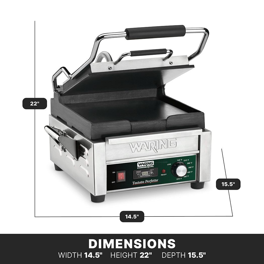 A stainless steel Waring panini press with flat cast iron plates is shown with its lid open at an angle. Dimensions are marked: width 14.5, height 22, and depth 15.5. The front panel features a dial, switches, and indicator lights.