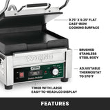 A compact toasting grill, this stainless steel Waring commercial panini press features flat cast iron plates, adjustable thermostats up to 570°F, and a timer with a large LCD display. Key features are labeled with text and lines pointing to each part.