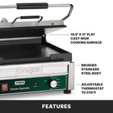 A Waring commercial Panini Grill with a brushed stainless steel body, a 14.5 x 11 cast iron cooking surface, and an adjustable thermostat up to 570°F is shown. Text labels highlight these features. The lower panel reads Tostato Supremo.