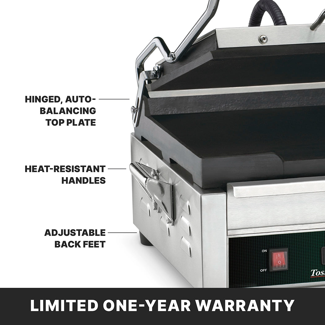 A close-up of a stainless steel Panini Grill with labeled features: hinged, auto-balancing top plate, heat-resistant handles, adjustable back feet, and a cast iron cooking surface. The bottom shows a power switch and LIMITED ONE-YEAR WARRANTY.