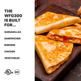 Three golden-brown quesadilla wedges with melted cheese and vegetables rest on a wooden board, prepared using a dual toasting grill with cast iron plates. On the left, bold black text lists foods: quesadillas, sandwiches, burgers, chicken, vegetables.