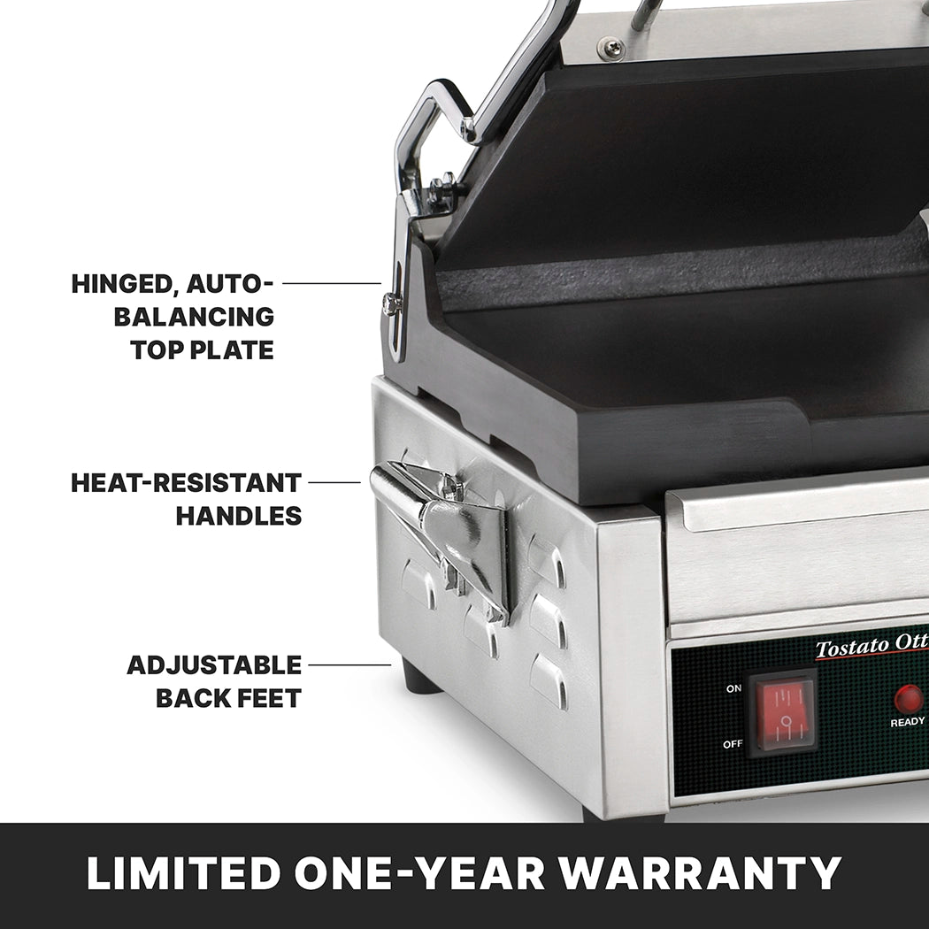 A close-up of a stainless steel dual toasting grill sandwich press with labeled features: hinged, auto-balancing top plate, adjustable thermostats, heat-resistant handles, and adjustable back feet. A red digital display is shown. Text reads, LIMITED ONE-YEAR WARRANTY.