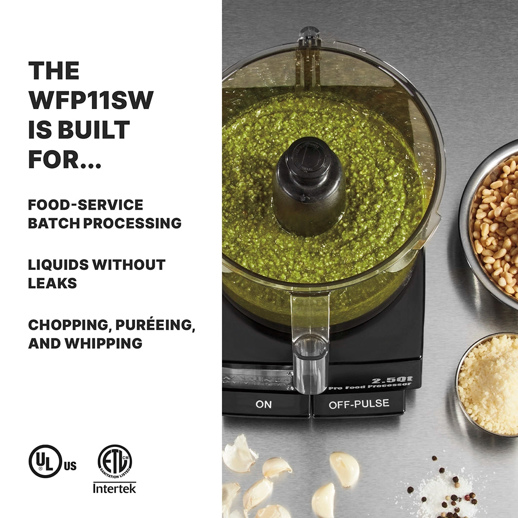 A 2.5 quart commercial food processor filled with green pesto sits on a stainless steel counter. Chopped nuts and garlic are nearby. Text on the left reads: The WFP11SW’s LiquiLock Seal System is built for no-leak batch processing, chopping, and puréeing.