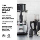 A stainless steel Waring WFP16SCDE combination food processor sits on a kitchen counter near its accessories. Text highlights high-volume, leak-free processing of soups, sauces, meats, and more with the continuous-feed batch bowl. Certification logos are below.