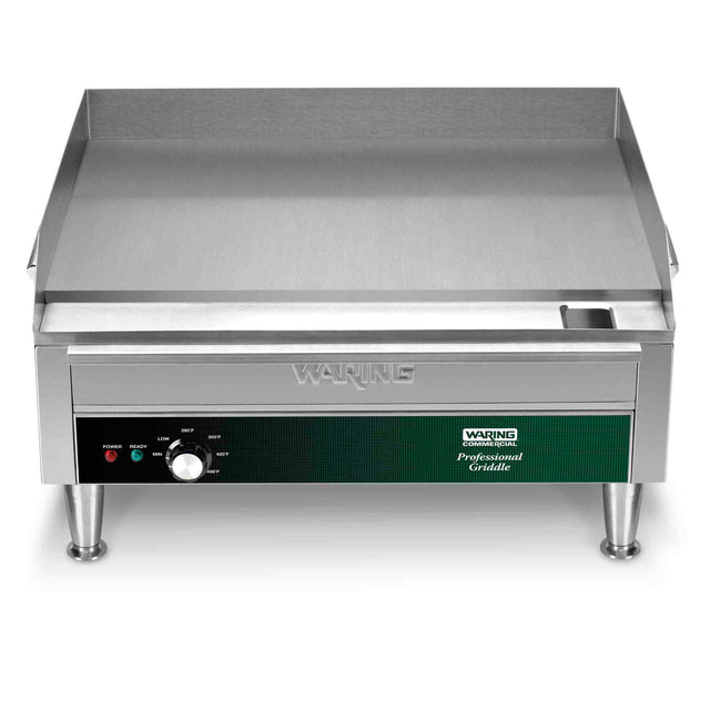 The Waring Countertop Electric Griddle features a 24" x 16" stainless steel cooking surface, raised back and side guards, control knob, indicator lights, and four short legs. The front panel displays the Waring logo and temperature settings.