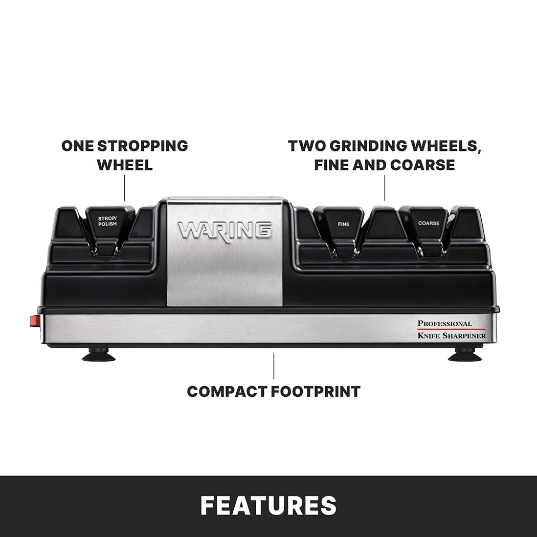 A front-facing electric Knife Sharpener labeled WARING, featuring one stropping wheel and two grinding wheels (fine and coarse). The compact, rectangular device has a stainless steel finish, black accents, and clearly labeled sharpening slots.