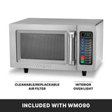 A stainless steel medium duty Microwave Oven with a digital display showing 2:30, a keypad with colored buttons, large handle, and labeled features: “Cleanable/Replaceable Air Filter” and “Interior Oven Light.” 1000 watts. Included with WM090.