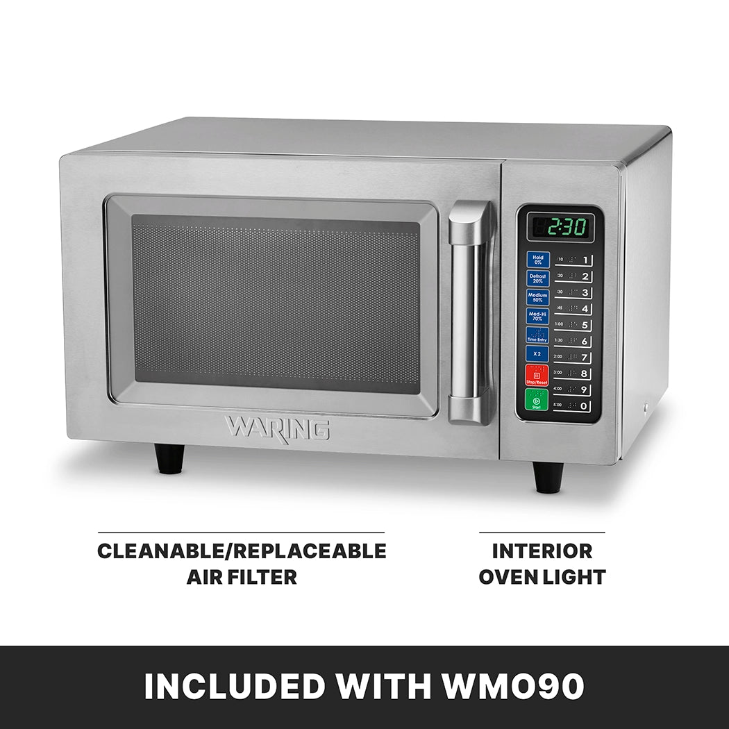 A stainless steel microwave oven with a digital keypad and display showing 2:30. Arrows point to its cleanable air filter and interior oven light. This medium duty, 1000 watts model includes a sturdy handle and sits on black feet. INCLUDED WITH WM090.