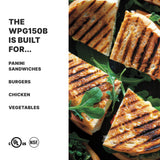 Grilled panini sandwiches with melted cheese and arugula, sliced diagonally, are stacked on a dark tray. On the left, bold text reads: The WPG150B Panini grill with cast iron plates is built for... Panini Sandwiches, Burgers, Chicken, Vegetables.