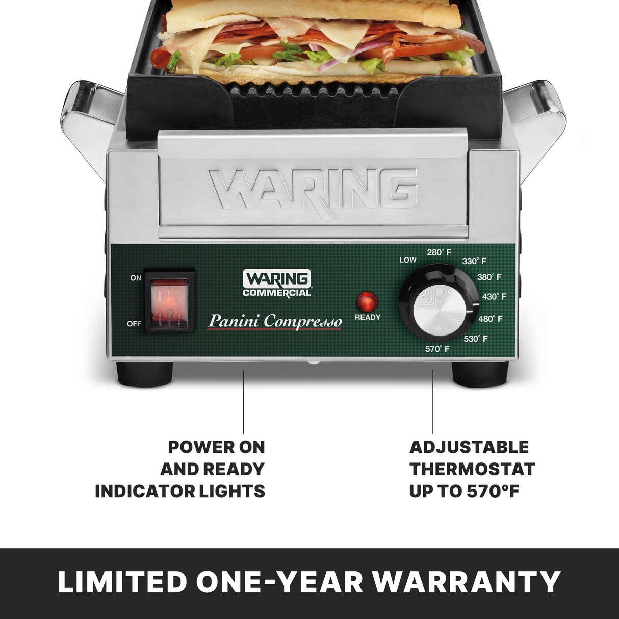 A stainless steel Waring Commercial panini grill with a sandwich inside. The control panel displays indicator lights, an on/off switch, and an adjustable thermostat knob from 220°F to 570°F. Features ribbed cast iron plates and a limited one-year warranty.
