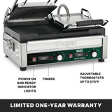A stainless steel Waring WPG300T dual panini grill sits open, showing grooved grill plates. The control panel features indicator lights, timers, and adjustable thermostats up to 570°F. Text highlights these features and notes a limited one-year warranty below.