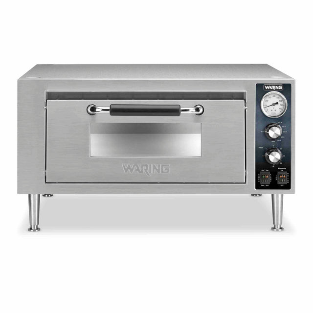 The Waring WPO500 is a stainless steel single deck pizza oven with a front door featuring a handle and small window. The control panel on the right has a temperature gauge, two dials, and indicator lights. It stands on four sturdy metal legs.
