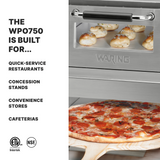 A stainless steel Double-Deck Pizza Oven bakes garlic knots above while a pepperoni pizza on a wooden peel slides out below. Text on the left lists uses: quick-service restaurants, concession stands, convenience stores, cafeterias.