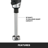 A close-up of a heavy duty immersion blender’s lower half, showing a 12-inch stainless steel shaft with a metal blade guard. A label reads 12 SHAFT; 40 qt capacity. A black bar below displays “FEATURES” in white text.