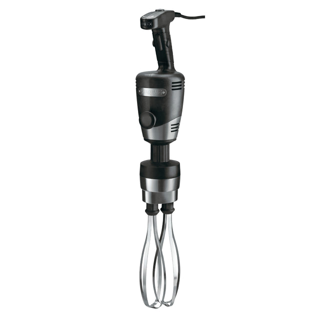 A black and silver commercial hand mixer with a thick handle, control button, and two sturdy stainless steel whisks extending downward. The industrial, robust design features a power cord from the top and stands out against a plain white background.