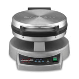 A stainless steel waffle maker with a round lid, “Waring” engraved on top, sits on a gray base with digital controls, buttons, and a screen displaying “425F.” This multipurpose cooktop looks modern, clean, and sturdy.