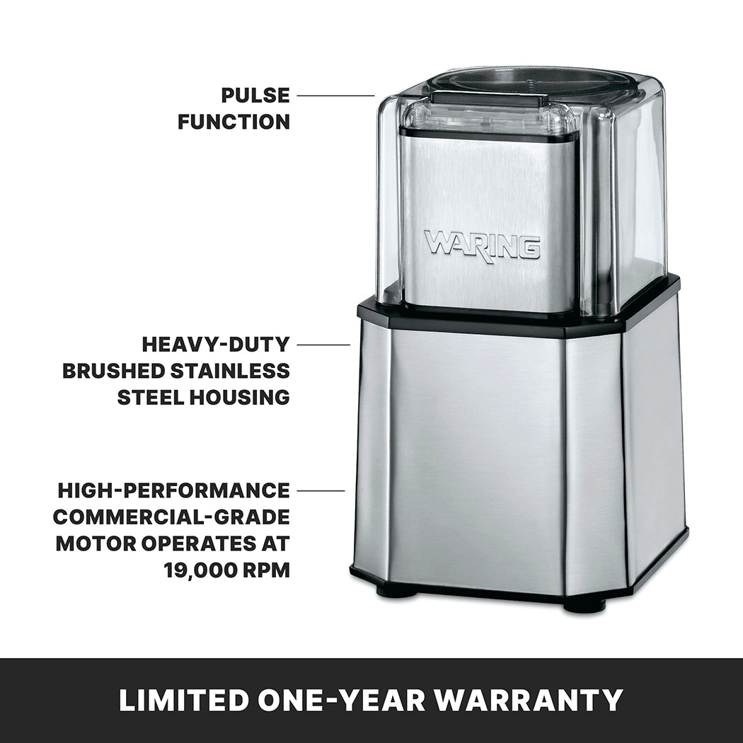 A brushed stainless steel Waring Professional Spice Grinder is shown. Labels highlight its pulse function, heavy-duty steel housing, and high-performance commercial-grade motor operating at 19,000 RPM. Text at the bottom states “Limited one-year warranty.”.