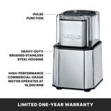 A brushed stainless steel Waring Professional Spice Grinder is shown. Labels highlight its pulse function, heavy-duty steel housing, and high-performance commercial-grade motor operating at 19,000 RPM. Text at the bottom states “Limited one-year warranty.”.