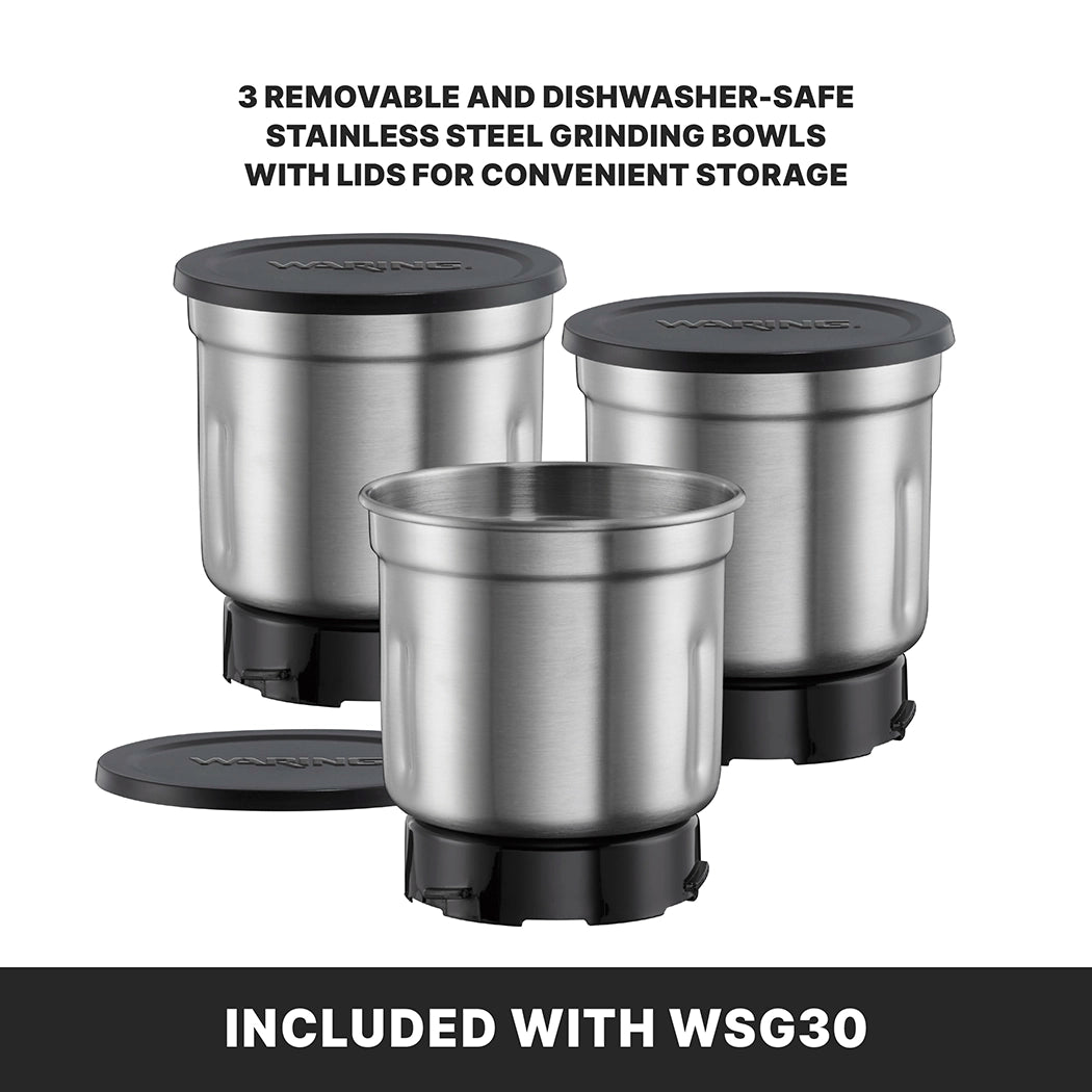 Three stainless steel grinding bowls with black lids are arranged together. One bowl is open, while the others stay lidded. Text highlights these removable bowls as dishwasher-safe and ideal for storage—perfect for any Professional Spice Grinder like the WSG30.