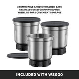 Three stainless steel grinding bowls with black lids are arranged together. One bowl is open, while the others stay lidded. Text highlights these removable bowls as dishwasher-safe and ideal for storage—perfect for any Professional Spice Grinder like the WSG30.