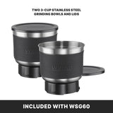 Two stainless steel grinding bowls with black textured exteriors and matching lids are shown, designed for the Waring WSG60KSDI Commercial Spice Grinder. Ideal for international use, these 3-cup bowls and lids come included with the WSG60.