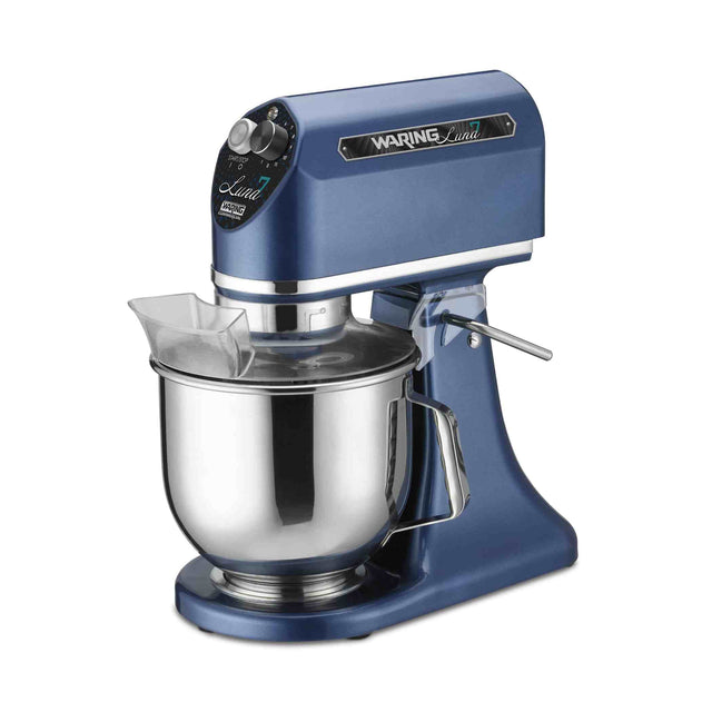 A blue Waring Luna Planetary Mixer with a 7 qt. stainless steel mixing bowl, clear plastic pouring shield, and front control dial. The mixer's arm is raised, and the “Waring Luna” brand name appears on the side of this countertop mixer.