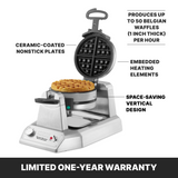A stainless steel Belgian Waffle Maker with ceramic-coated nonstick plates is shown open, displaying a baked waffle inside. Labeled features highlight its heating elements, space-saving vertical design, and one-year limited warranty.