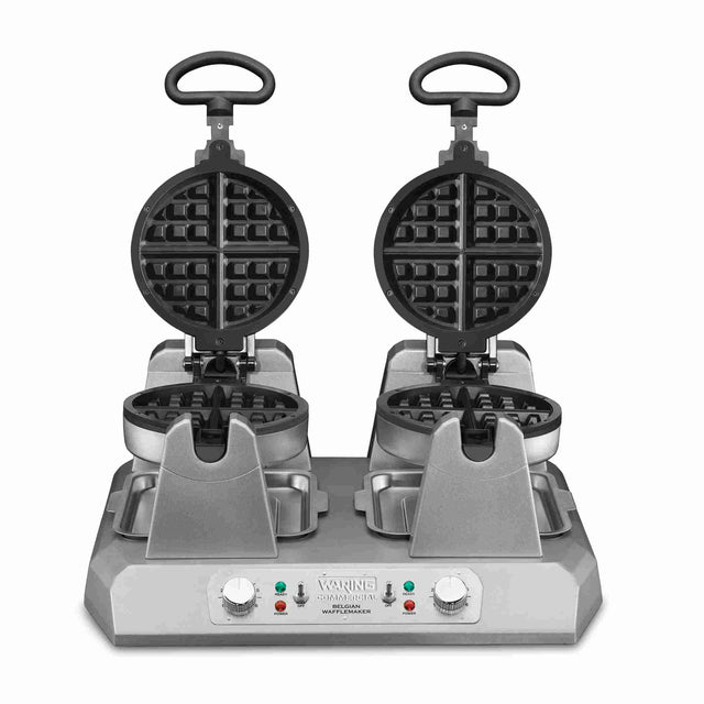 A heavy duty Commercial Belgian Waffle Maker with two round non-stick plates opens vertically, side by side. The metallic base features dual control knobs, indicator lights, and handles for easy use. The modern design suits any professional kitchen.