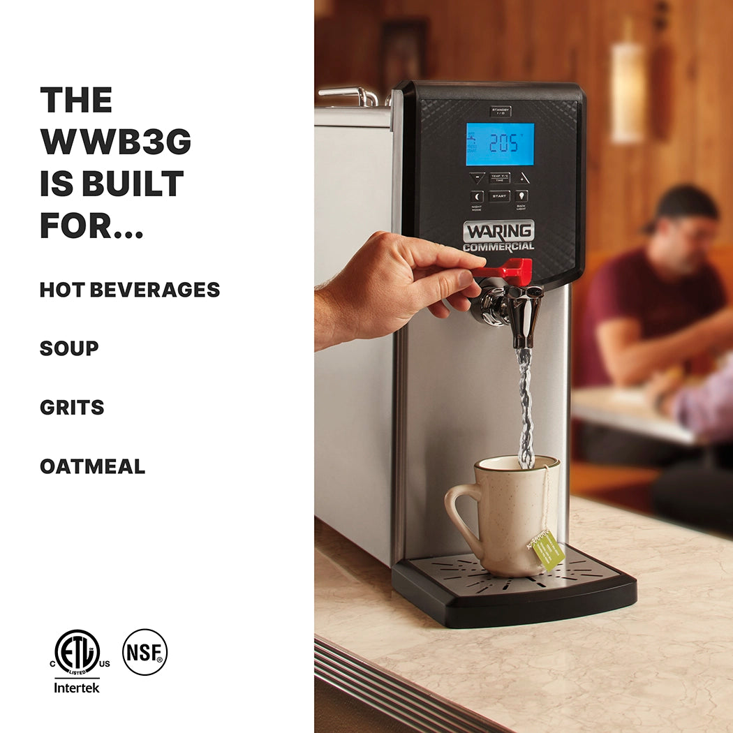 A person dispenses hot water from a Waring 3 gallon Hot Water Dispenser into a ceramic mug on the kitchen countertop. The digital display shows the temperature, with text listing uses: hot beverages, soup, grits, and oatmeal. Certification logos are below.