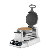 A stainless steel waffle cone maker with double non-stick plates produces a round, golden waffle. The open lid reveals the perfect grid pattern, while the modern control panel makes it ideal for commercial use.