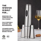 A rechargeable wine opener stands upright in its charging base on a kitchen counter, with a glass of white wine nearby. Text highlights features: opens 120 corks per charge, portable design, perfect for catering and bars.