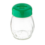 A small, empty Cheese Shaker with a clear glass body and a slotted green top featuring two elongated dispensing holes, photographed against a white background.