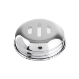 A slotted chrome lid with three vertical oval slots sits atop a smooth, reflective surface. Its slightly raised rim suggests it’s a replacement shaker top for swirl glass shakers. The background is plain white.