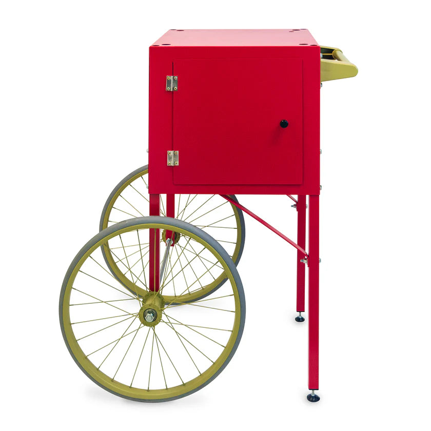 A red metal Fun Pop Cart with a rectangular body, perfect for dry goods storage, features a side door, two large gold wheels up front, small back legs, and a gold handle on top. Its minimalist and industrial style makes for easy assembly.