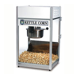 A countertop popcorn maker with transparent sides showcases a 6 oz kettle corn machine, featuring a steel popping kettle at the top and a pile of fresh kettle corn at the bottom. The front displays a “Kettle Corn” sign in bold black letters on white.