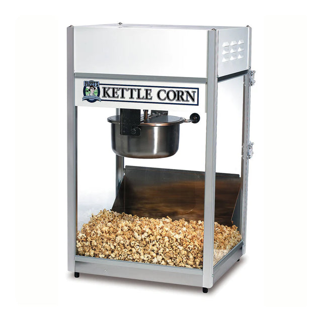 A countertop popcorn maker with transparent sides showcases a 6 oz kettle corn machine, featuring a steel popping kettle at the top and a pile of fresh kettle corn at the bottom. The front displays a “Kettle Corn” sign in bold black letters on white.