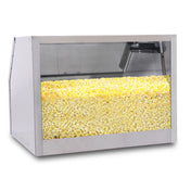 A large silver and glass popcorn storage cabinet filled to the top with yellow popcorn. Clear panels offer a full view inside, while LED lighting highlights the popcorn. The background is plain and the case is empty except for the popcorn.