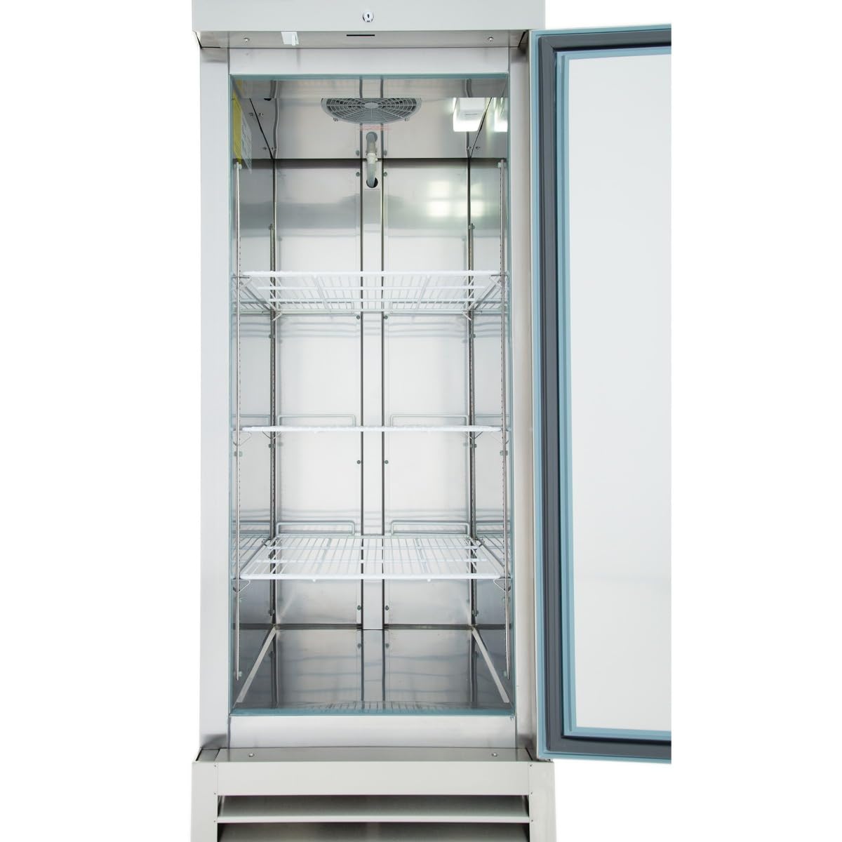 A stainless steel, upright reach-in refrigerator with the door open reveals three empty wire shelves inside. The interior is clean and well-lit, featuring a blue gasket seal on the door. The vent and control panel are visible at the bottom.