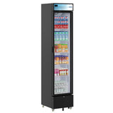 Tall black commercial merchandiser refrigerator with a glass door, stocked with various drinks. Milk cartons fill the top shelf, juice boxes and bottled juices are below, while ready-to-drink beverages and clear bottled water line the bottom shelves.