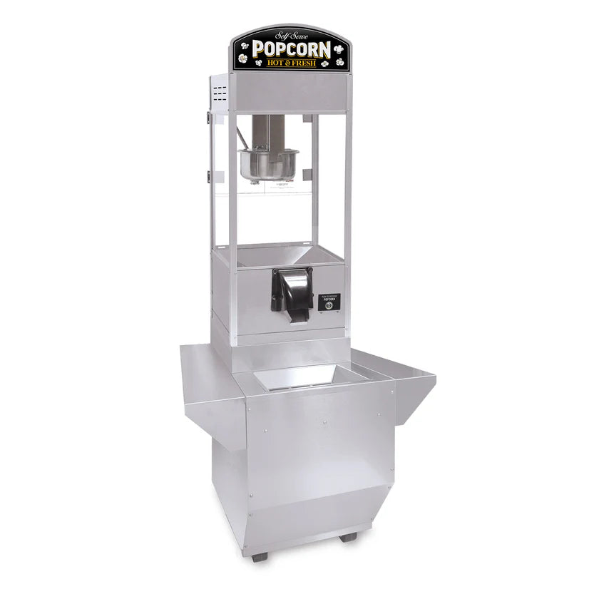 A silver popcorn popper with a glass enclosure and kettle inside. The top sign reads “Popcorn Hot & Fresh.” This countertop model features side trays on the lower base and small wheels for mobility, perfect for any snack station.