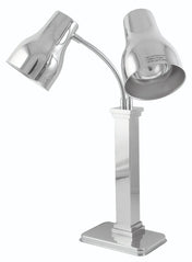 A shiny, modern stainless steel desk lamp features a rectangular base and two adjustable necks, each ending in a cone-shaped shade facing different directions. The lamp’s metallic surface is highly reflective.