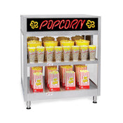 A metal display rack, like a Gold Medal Products countertop popcorn cabinet, holds tubs and boxes of popcorn. The top shelf features yellow tubs, and below are striped red-and-white boxes. A neon “POPCORN” sign with yellow accents tops the rack.