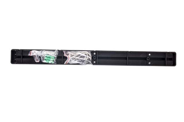 A long, rectangular black plastic case—perfect for Cash & Carry—holds several white wires and a green circuit board, partially wrapped in clear plastic. The 18 inch case is open, revealing empty compartments and electronic components inside on a white background.