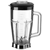 A transparent 48 oz Waring blender container with measurement markings, black lid, and handle. The base has metal blades for blending, and the jar is empty. The lid features a clear circular insert in the center. Image on a white background.