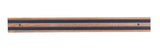A wood magnetic holder mounts to wall with two visible screws, featuring two parallel black magnets running horizontally across its length. The strip is set against a white background.