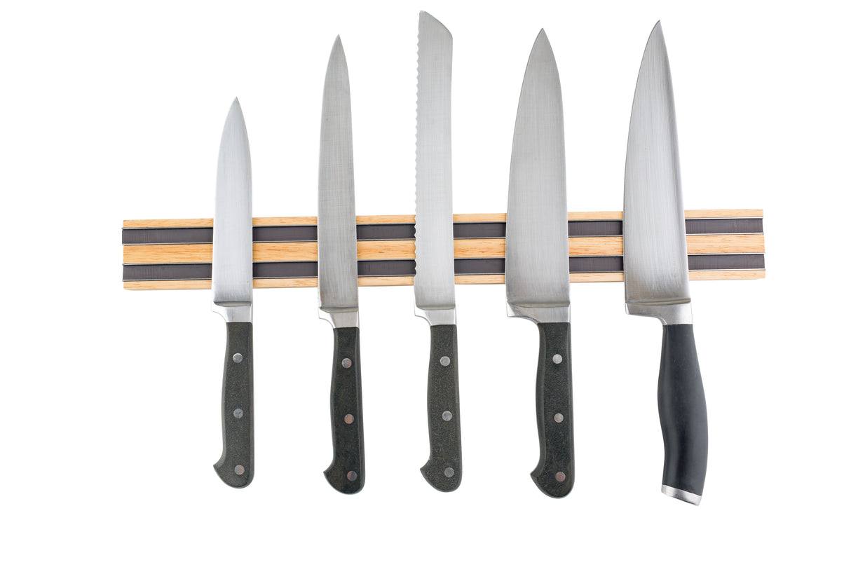 Five kitchen knives with black handles are evenly spaced on a wood magnetic holder that mounts to the wall. Displayed on a white background, the set includes a serrated bread knife and four chef or utility knives with smooth blades.