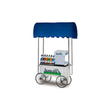 A white shave ice wagon with four large wheels and a blue canopy holds a snow cone machine on a stainless steel counter, with colorful syrup bottles lined up. The cart displays the “Hawaii’s Finest” logo and is set against a plain white background.