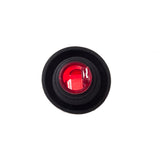 A circular object with a black outer ring and a transparent red center, viewed from above. The red section reflects light, contains a grid-like texture inside, and functions as a BPA-free screen pourer. The background is plain white.