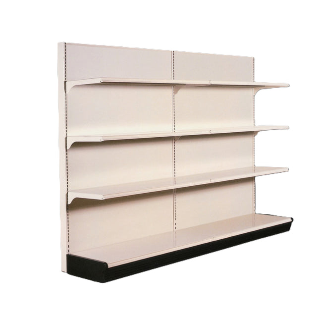 A beige metal Kent Unlimited retail shelving unit with four horizontal shelves and a solid back panel, ideal as wall storage. The bottom shelf is deeper and features a black kickplate along the front edge, all isolated on a white background.